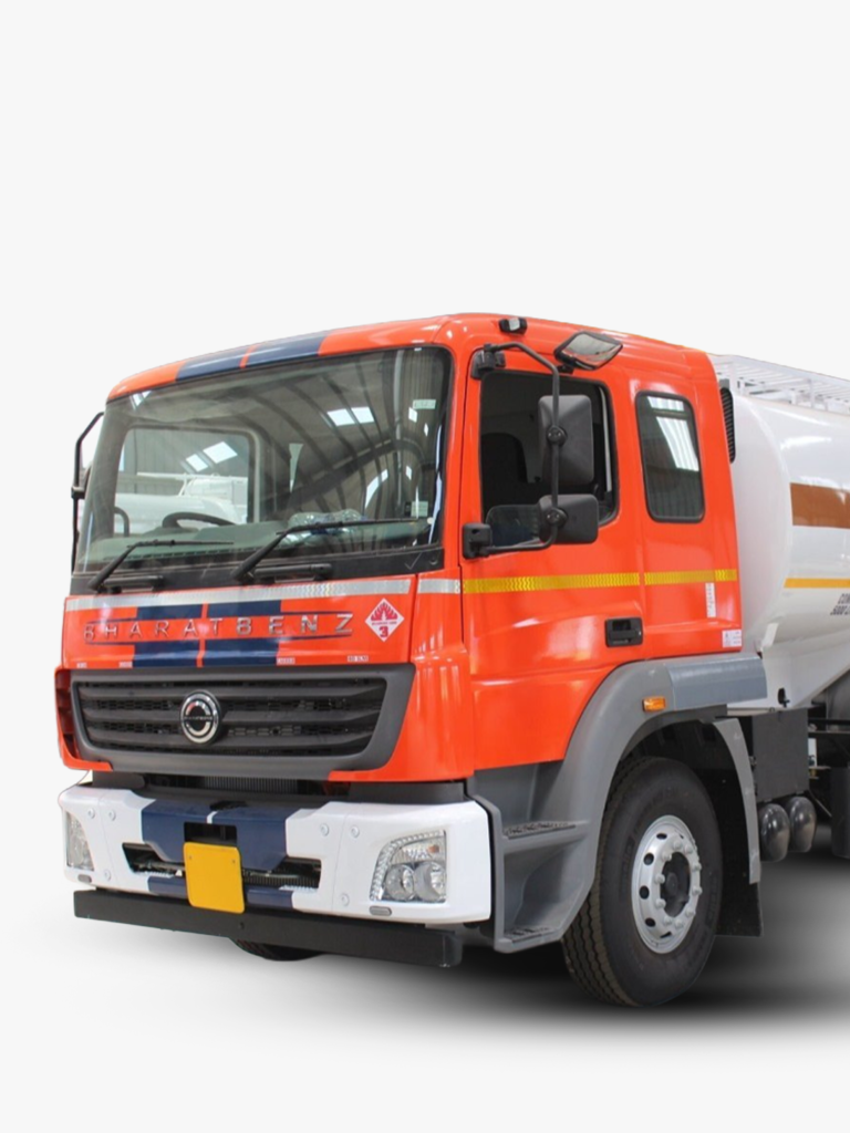 A side-angle studio shot of a bright orange BharatBenz Light Diesel Oil (LDO) tanker truck, featuring blue racing stripes on the cab and a large white cylindrical tank, isolated against a plain light background.